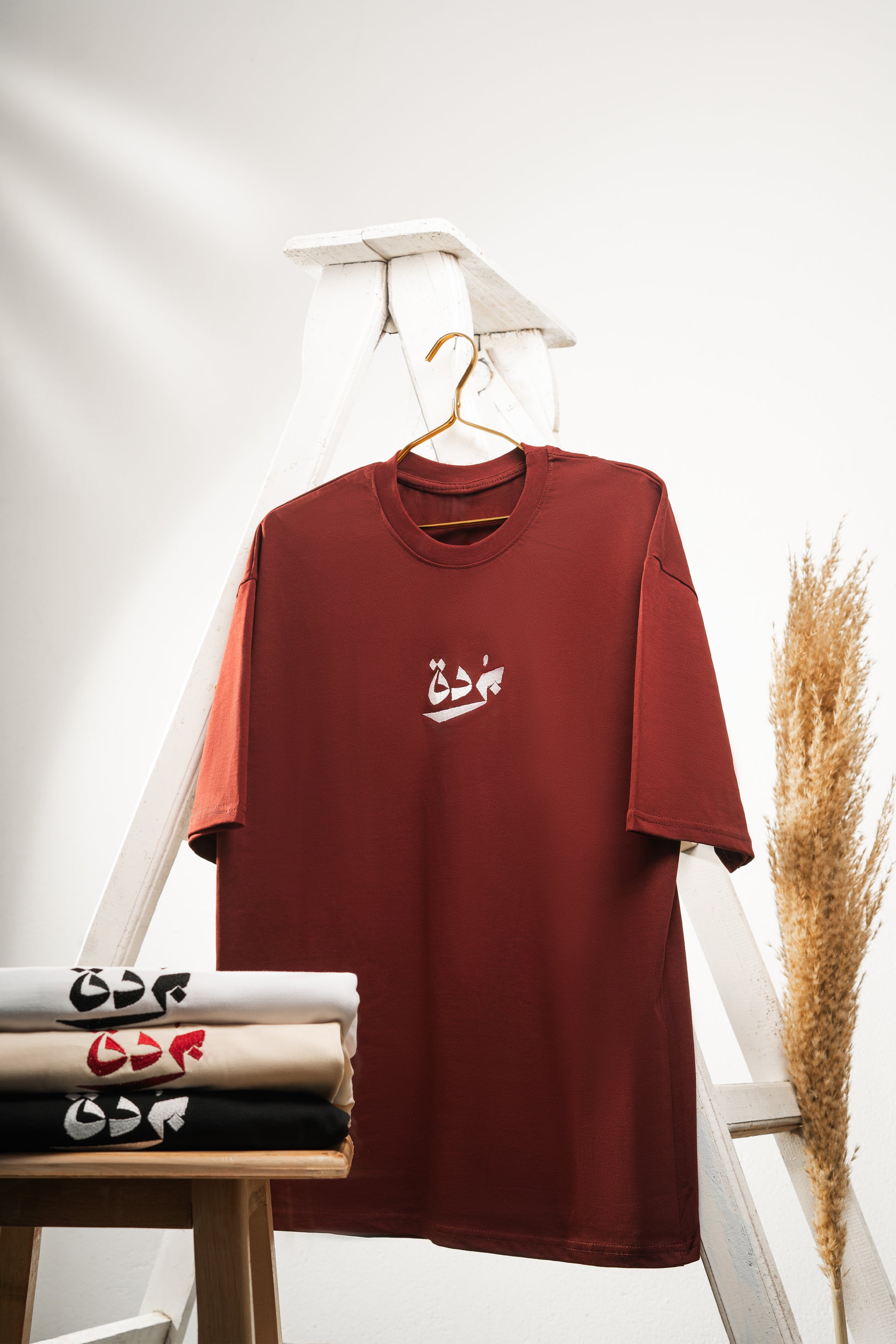 Oversize T-shirt (خُلقتُ من  الحًدِيدِ)